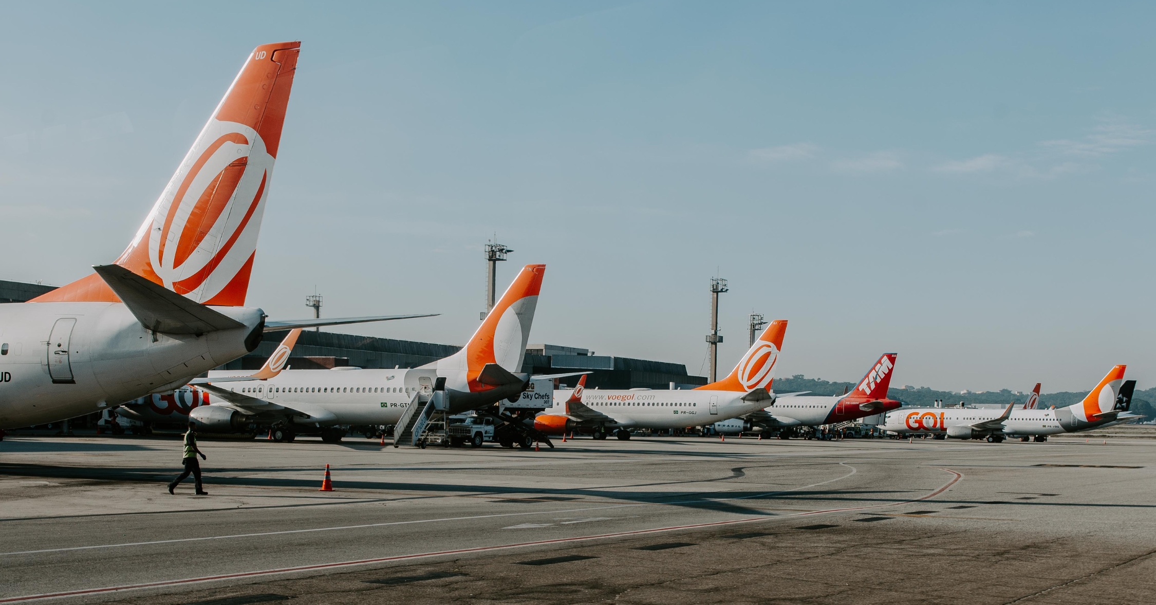 Airplanes parked infront of terminals